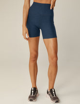blue high-waisted 5" biker shorts.